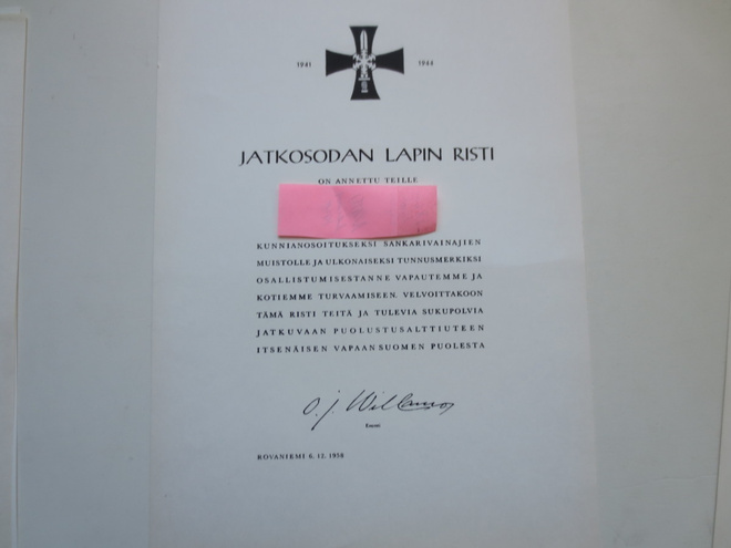 Lapin Sodan Ristin Myöntökirja. v.1958
