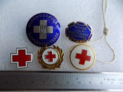 Punainenristi + siniset merkit red cross healthcare secto