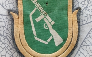 Koulutushaaramerkki konepistoolimies
