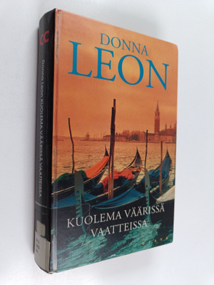 Donna Leon : Kuolema väärissä vaatteissa