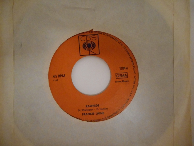 FRANKIE LAINE 7"Vinyyli RAWHIDE V.1961