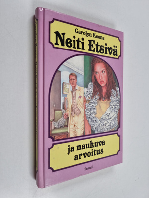Carolyn Keene : Neiti Etsivä ja naukuva arvoitus