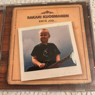 SAKARI KUOSMANEN: Entä jos… * FIN 2003