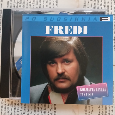 Fredi - 20 suosikkia • Kolmatta Linjaa takaisin (CD)