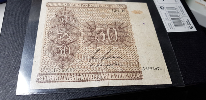 50 mk 1945 litt b    kl  4 repeämä yläreunassa