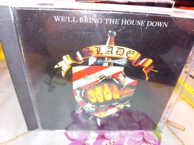 CD Slade : We'll bring the house down ( SIS POSTIKULU  )