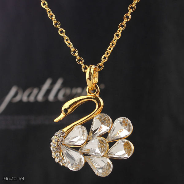 1229 ..  Gold Austrian Crystal White Sapphire Swan