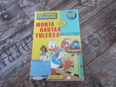 Aku Ankan taskukirja 160 - Monta rautaa tulessa (1.painos)