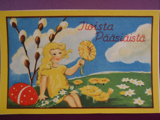 Etel Raivio tytöllä leskenlehti kädessä