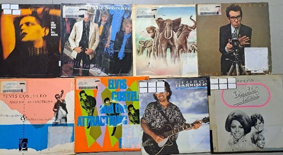 6 Kpl LP Kirjastopoisto levyjä Elvis Costello,Lou Reed ym.