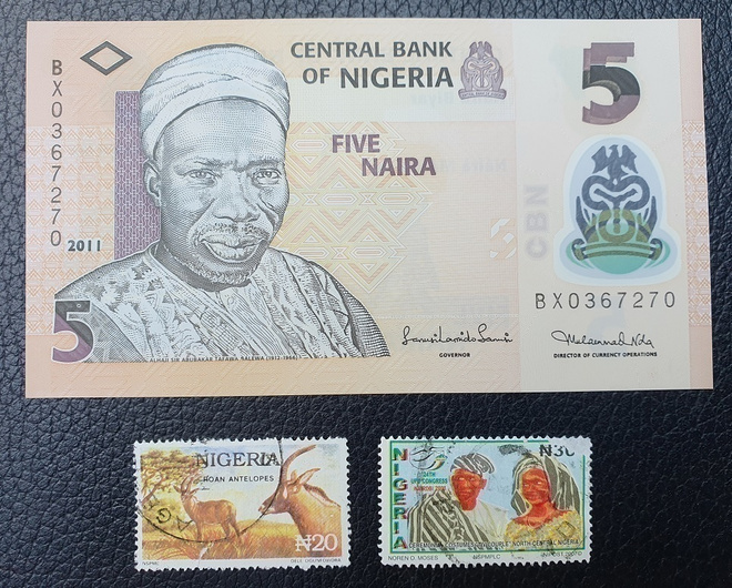 Polymeeriseteli Nigeria 5 NAIRA UNC + 2 postimerkkiä