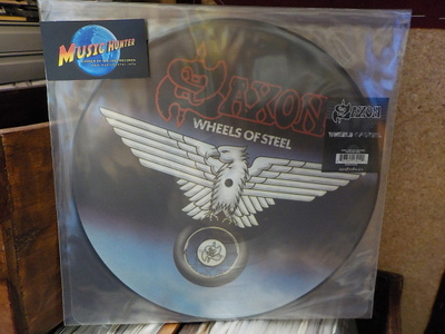 SAXON - WHEELS OF STEEL UUSI KUVALEVY 2005 uk