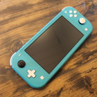 Nintendo Switch Lite *korjattavaksi tai varaosiksi* - pikkukuva 1
