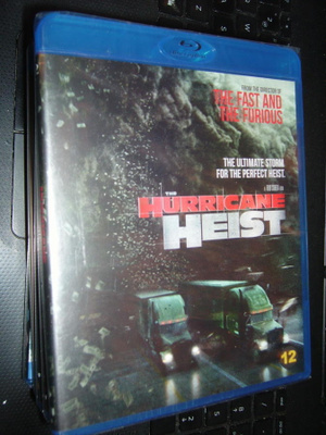 Blu-ray  :  HURRICANE HEIST  ( UUSI ! )   sis. postik.