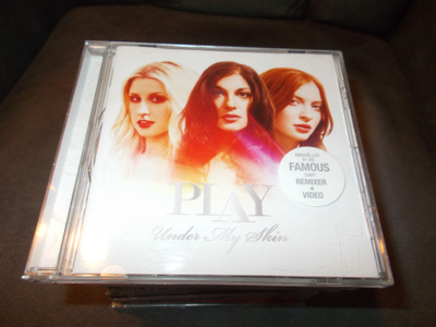 CD PLAY ** UNDER MY SKIN **