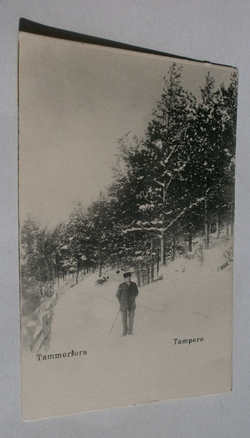 Tampere, talvikuva, mies metsäisen harjun kupeessa, ei p.