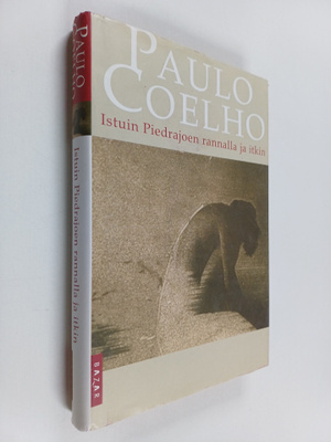 Paulo Coelho : Istuin Piedrajoen rannalla ja itkin