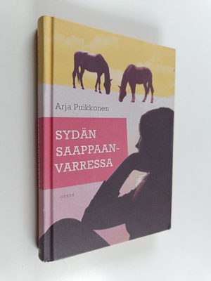 Arja Puikkonen : Sydän saappaanvarressa