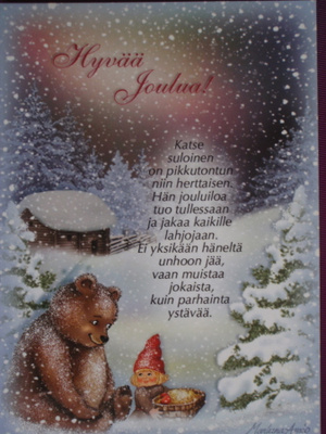 Marleena Ansio nalle ja tonttutyttö lumisateessa