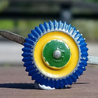 Vanha peltinen kokardi, halkaisija 18 mm. Piikit ovat ehjät. - pikkukuva 5