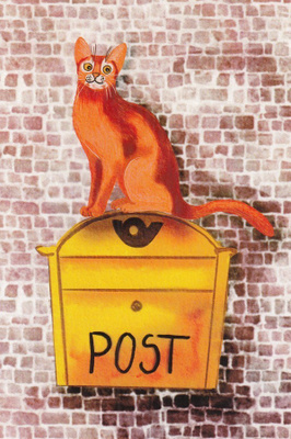 Kissa postilaatikon päällä