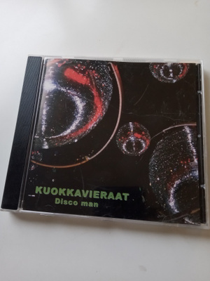 CD KUOKKAVIERAAT - Disco Man   ( Sis.postikulut )
