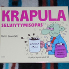 KRAPULA - Selviytymisopas # KIRJA - pikkukuva 1