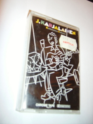 J. KARJALAINEN - Keltaisessa Talossa C-Kas. (Sis.postikulut)