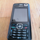 Nokia N70 ja laturi - pikkukuva 1