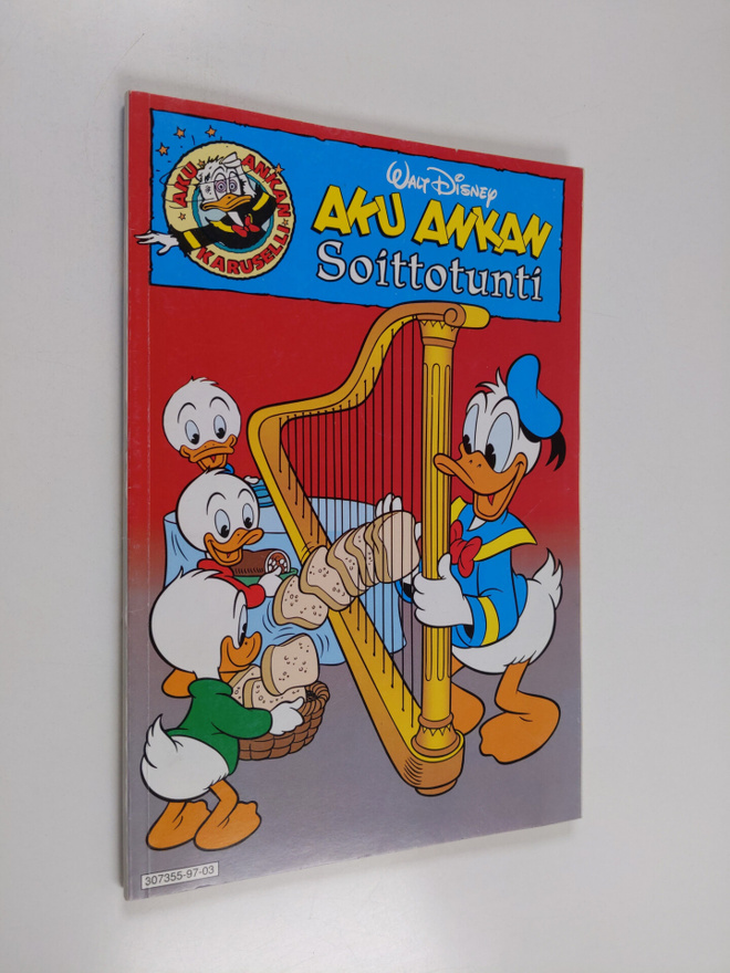 Walt Disney : Aku Ankan soittotunti