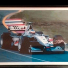 Valokuva Mika Häkkinen ajamassa McLaren-tallin autoa - pikkukuva 1
