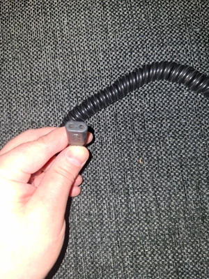 Philips partakoneen laturi
