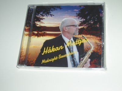 CD Håkan Mattjus - The Midnight Sun Never Sets (Uusi)