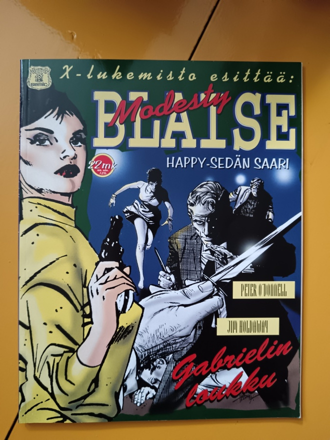 X-Lukemisto Modesty Blaise : Happy-sedän saari