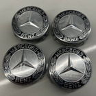 Mercedes-Benz vanteiden uudet mustat laakeriseppele keskikup - pikkukuva 1