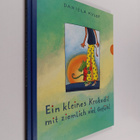Daniela Kulot : Ein kleines Krokodil mit ziemlich viel Ge... - pikkukuva 1