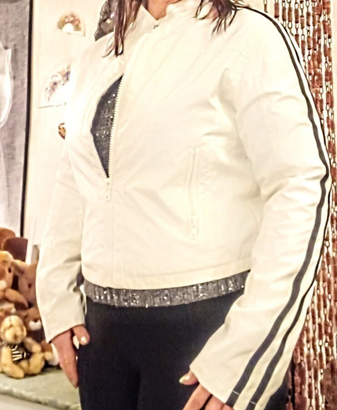 Reflexin kevyesti topattu takki.