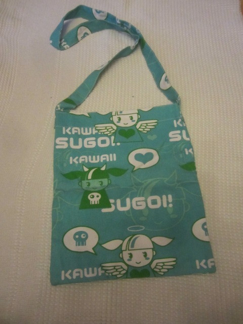 Kassi turkoosi Kawaii   Sugoi! -tekstit ja enkelit & pirut