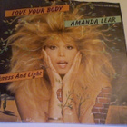 AMANDA LEAR :: LOVE YOUR BODY/DARKNESS AND LIGHT::VINYYLI 7" - pikkukuva 1