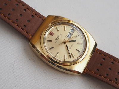 Omega Geneve Megaquartz 32 Khz,postikuluineen pakettina.