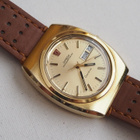 Omega Geneve Megaquartz 32 Khz,postikuluineen pakettina. - pikkukuva 1
