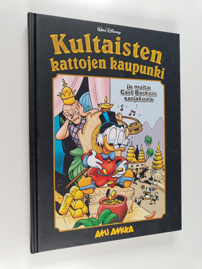 Kultaisten kattojen kaupunki ja muita Carl Barksin sarjak...