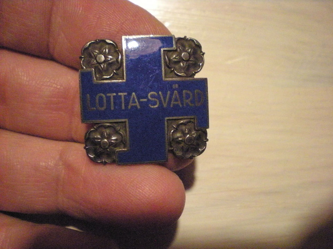 Hopeinen Lotta merkki