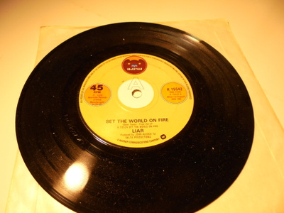 7" Liar-Set The World On Fire /High On Love