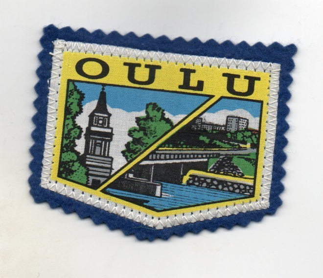 Oulu: Matkailu /hihamerkki  (kangasta)