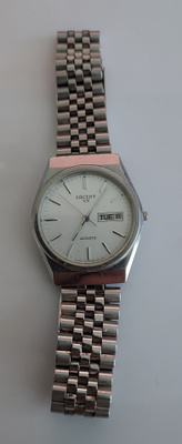 Orient VX quartz rannekello