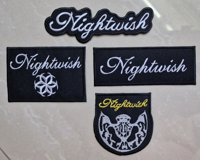 4 kpl erilaisia NIGHTWISH kangasmerkkejä 2.50e/kpl tai...