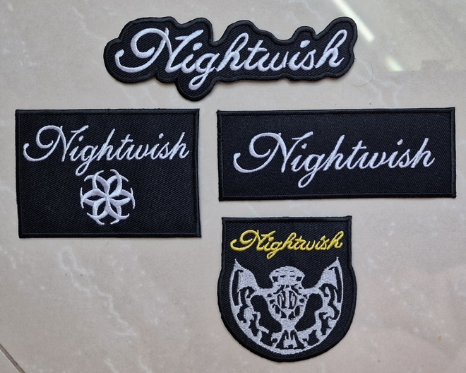 4 kpl erilaisia NIGHTWISH kangasmerkkejä 2.50e/kpl tai...
