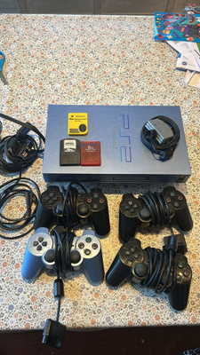 Playstation 2 FAT Aqua Blue, 4kpl ohjaimia + muistikortteja