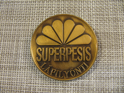 Superpesis. Läpilyönti mitali 1995.